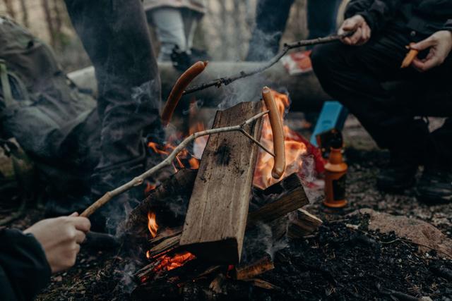 People sitting around a campfire